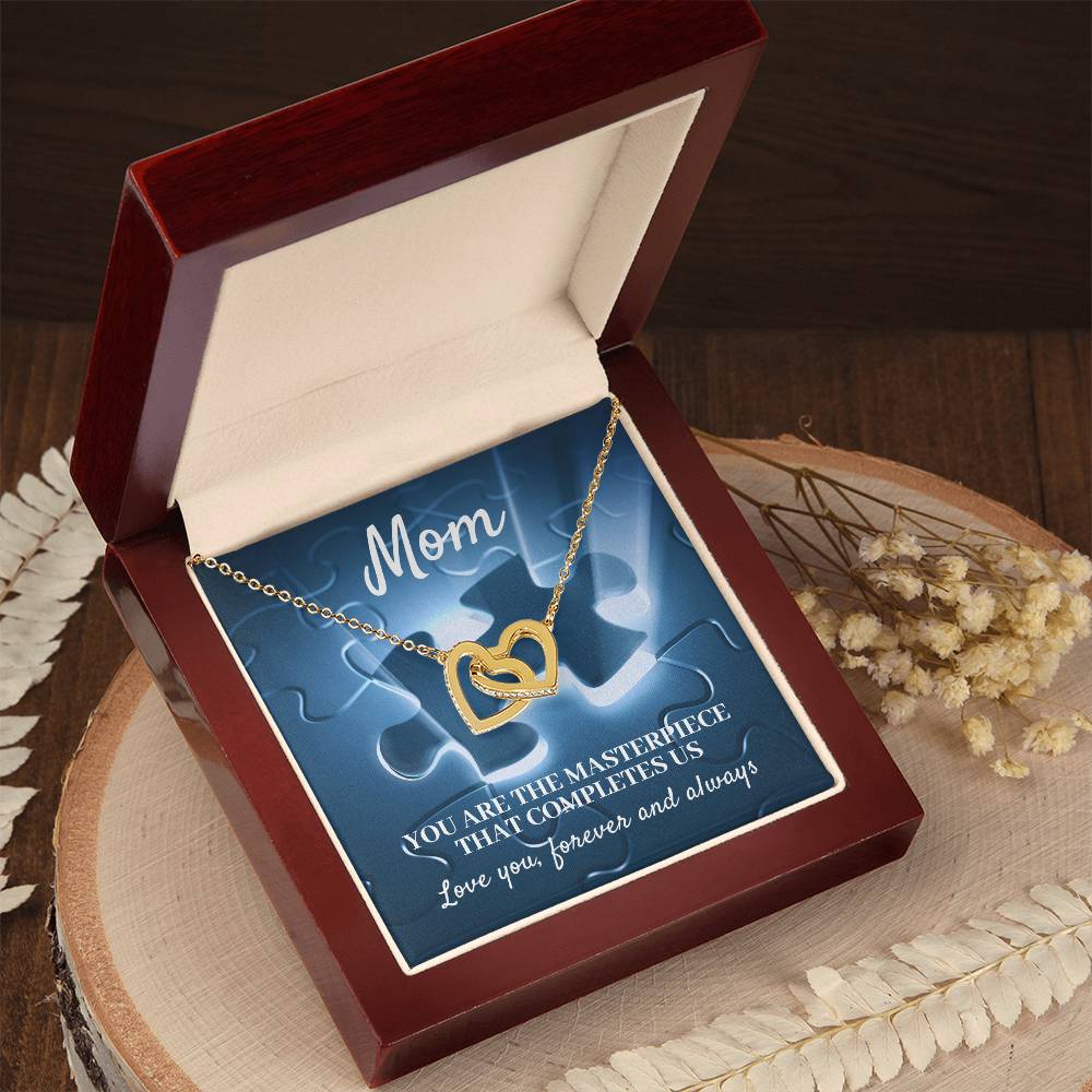 MOM, YOU ARE THE MASTERPIECE THAT COMPLETES US - INTERLOCKING HEARTS NECKLACE